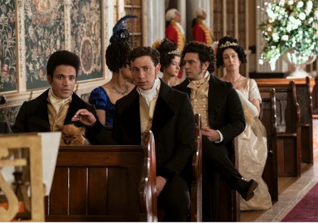 Three princes and three princesses seated in pews.