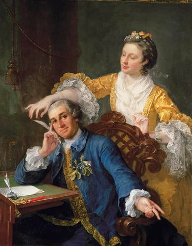 Double portrait of a man in a blue coat seated at a writing desk, with a woman in yellow behind him, reaching for his quill.